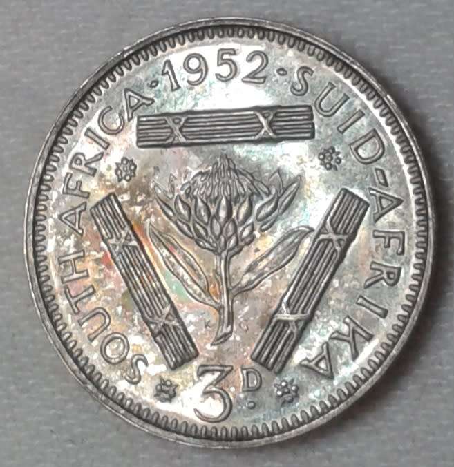 Nice 1952 union proof silver tickey with iridescent toning