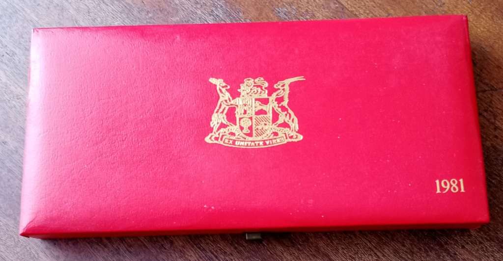 Partial 1981 proof set in red box (50c-1/2c)