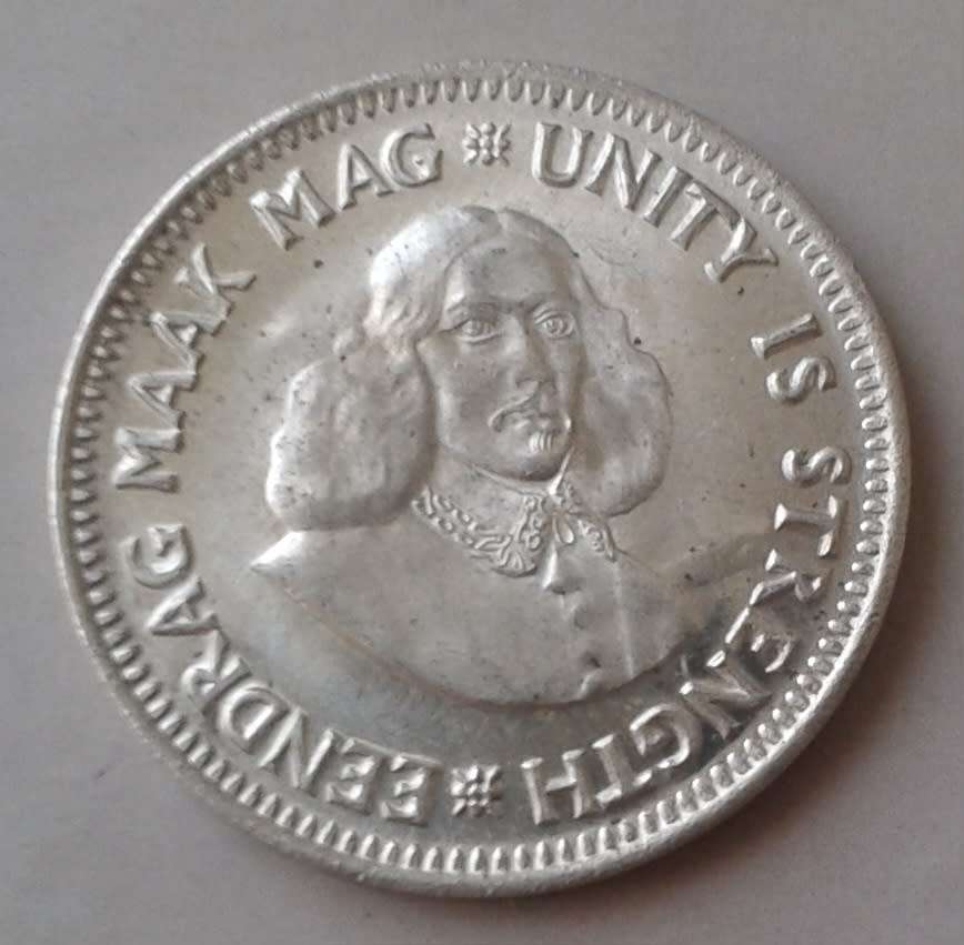 Uncirculated 1961 Republic silver 2 1/2c in coin flip