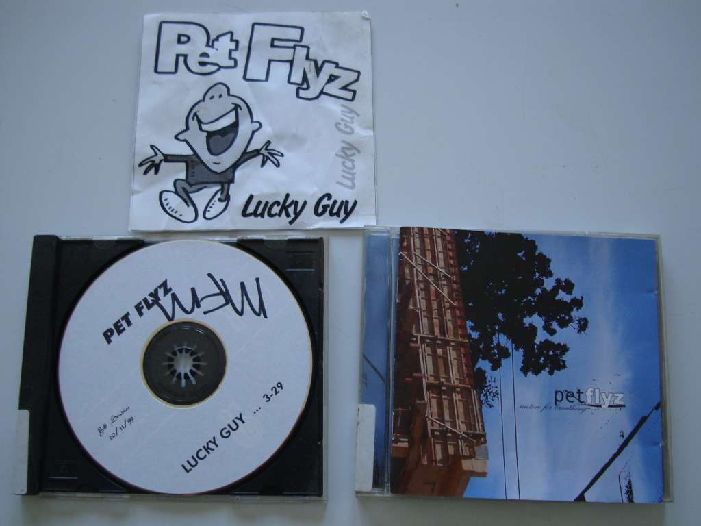 2 x Pet Flyz Cd`s - Motive for Breathing + Lucky Guy Demo