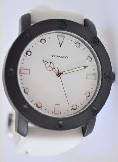 BRAND NEW Tomato Gents White Rubber Band and White Dial with Black Bezel with two year Warranty