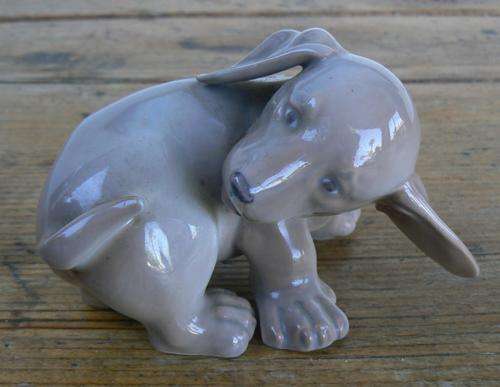 Royal Copenhagen dog chasing tail figurine #1407