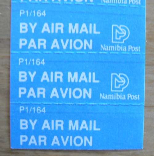 Namibia strip of 10 airmail labels with print error