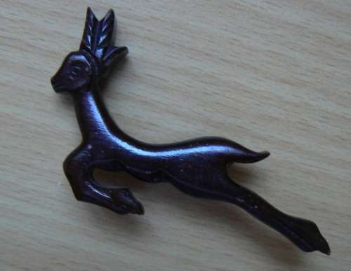 Vintage Springbok wooden brooch