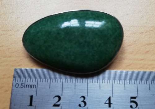 Vintage silver brooch with green semi-precious stone