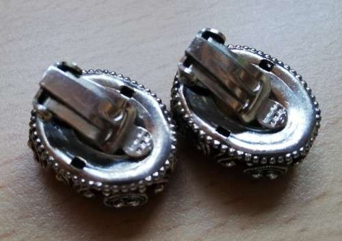 Vintage clip-on earrings - lovely metal detail and large purple stone