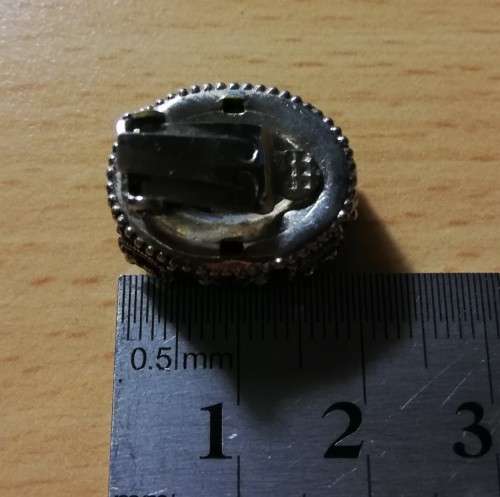 Vintage clip-on earrings - lovely metal detail and large purple stone