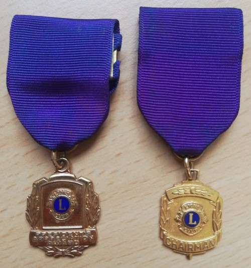 Pair of small 10ct gold-filled Lions Club awards