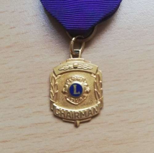 Pair of small 10ct gold-filled Lions Club awards