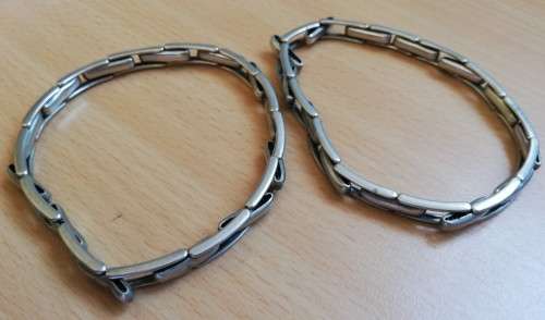 Two metal bracelets with elastic inner, stamped