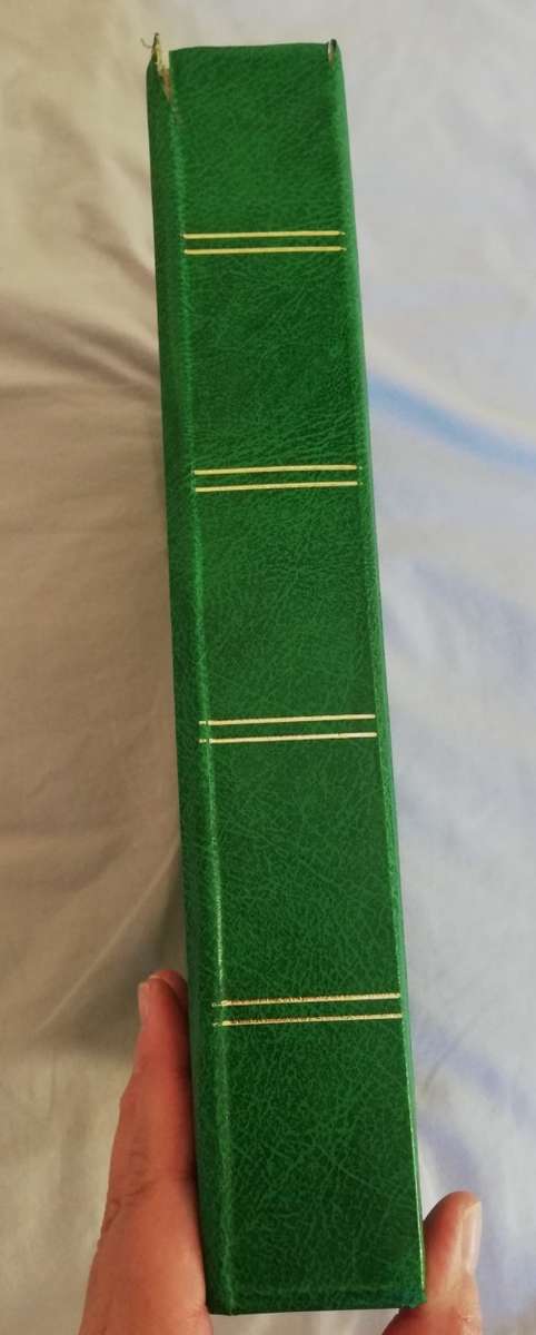 Stamp album, slightly damaged, 32 pages