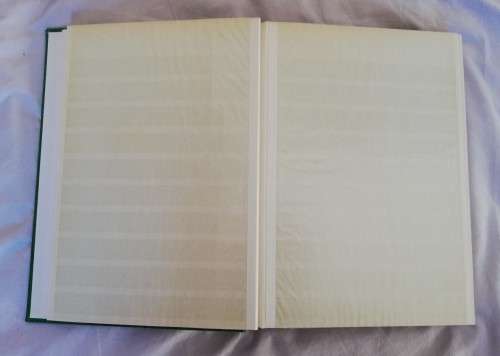 Stamp album, slightly damaged, 32 pages