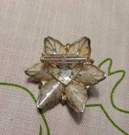 Silver-coloured mesh with dark stone and diamante detail