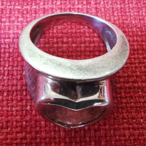 Vintage sterling silver ring with pink heart-shaped stone