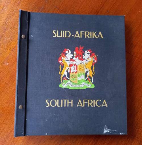 Vintage used South African Davo stamp album 1910-1977, with some stamps