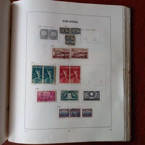 Vintage used South African Davo stamp album 1910-1977, with some stamps