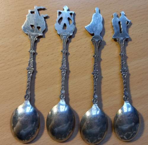 Lot of 4 vintage demitasse figural spoons, made in England, stamped SN
