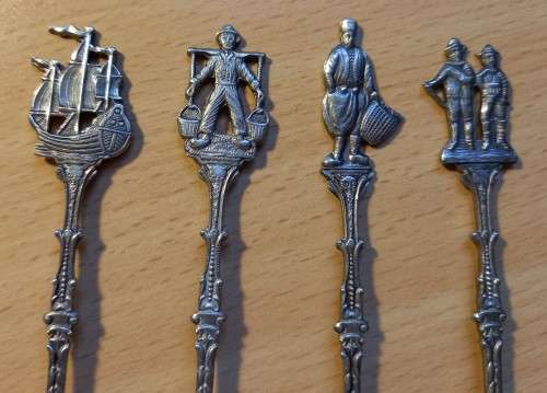 Lot of 4 vintage demitasse figural spoons, made in England, stamped SN
