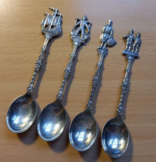 Lot of 4 vintage demitasse figural spoons, made in England, stamped SN