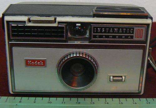 Vintage Kodak instamatic camera in leather case.