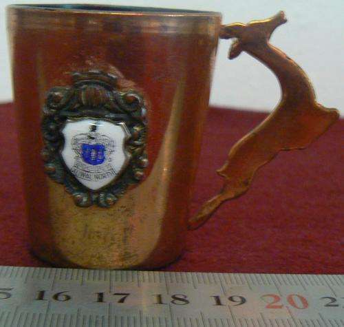 Copper tot measure with Aliwal North emblem and springbok handle