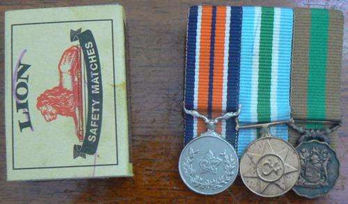 Lot of 3 miniature medals - Good Service, Unity and General Service, mounted with ribbons and bars