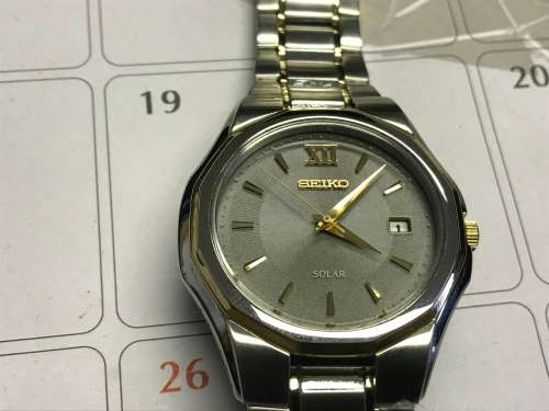Seiko silver tone solar men's watch top