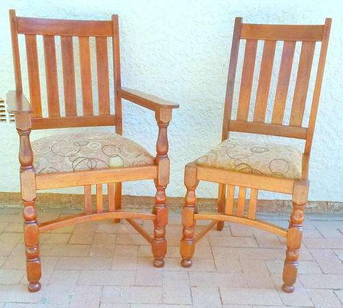 Stunning set of vintage "His and hers" Burmese teak chairs.   See guarantee.