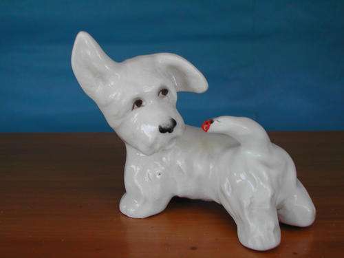 Beswick, West Highland Terrier with Ladybird on its Tail.