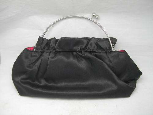 Black Handbag, Unused