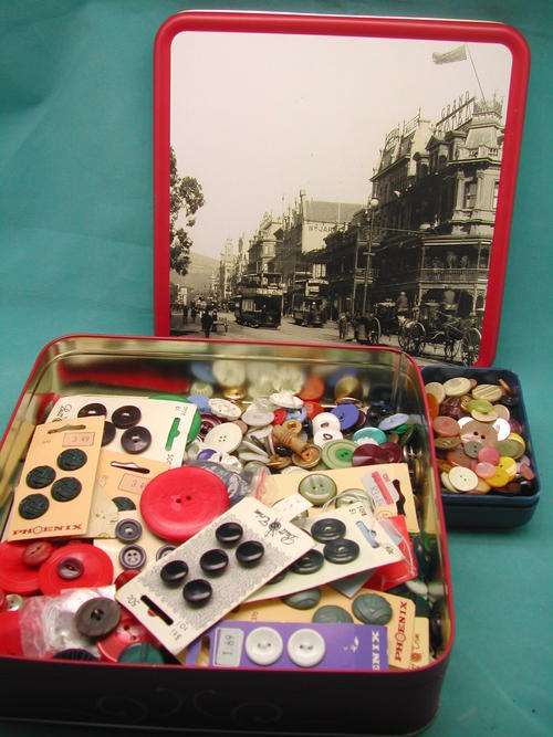 Buttons for Africa, Contained in Tin