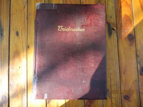 MASSIVE MIXED WORLD MIXTURE IN A4 32 PAGE 64 SIDE ALBUM. IN FAIR CONDITION.