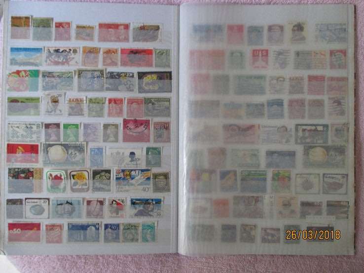 CLEAN A4 STOCKBOOK FULL OF MIXED WORLD STAMPS