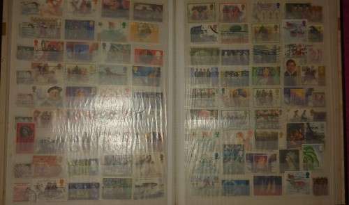 GREEN STOCKBOOK MIXED WORLD FOR SORTING AS SHOWN IN PHOTOS 15 PAGE 30 SIDES