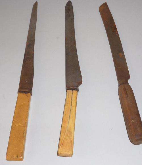 Rustic Butchers Knives and a Bread Knife