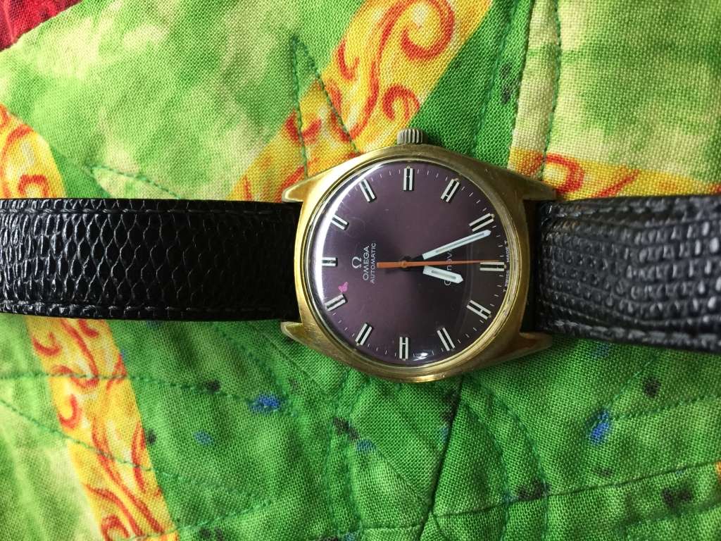 Stunning oxblood mens 38mm Omega Geneve