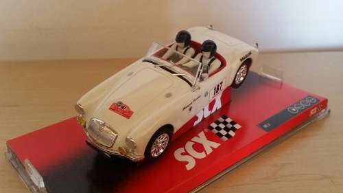 SCX MG A with lights. Mint and boxed