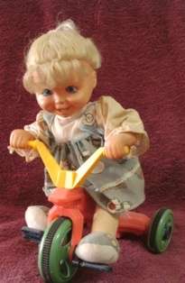 Doll on a Tricycle