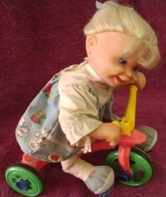 Doll on a Tricycle