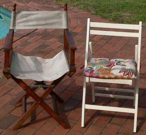 1 STUDIO DIRECTOR CHAIR WITH REMOVABLE MATERIAL AND 1 WOODEN FOLD CHAIR