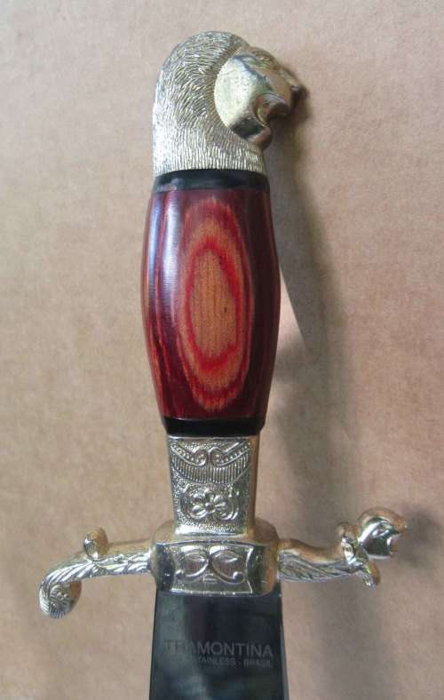 decorative dagger in cow hide sheath, metal blade with makers mark and cow hand engraving VGC