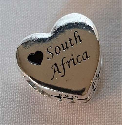 Beautiful Authentic Sterling silver PANDORA Bracelet 10 x starter charms VALUE over R6000 R1 NR