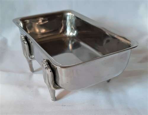 Seldom seen Carrol Boyes Stainless Steel oblong soap or sauce dish with 4 standing man feet. VGC