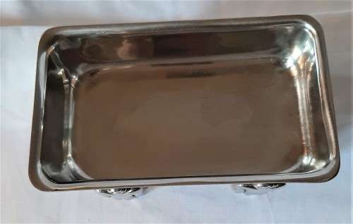 Seldom seen Carrol Boyes Stainless Steel oblong soap or sauce dish with 4 standing man feet. VGC