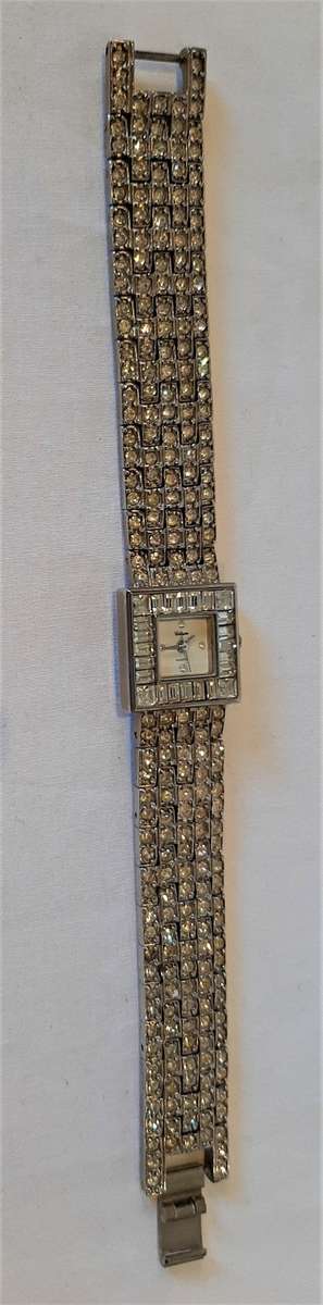 18k white gold plated ladies watch, quartz movement, strap and bezel encrusted Rhinestones NW