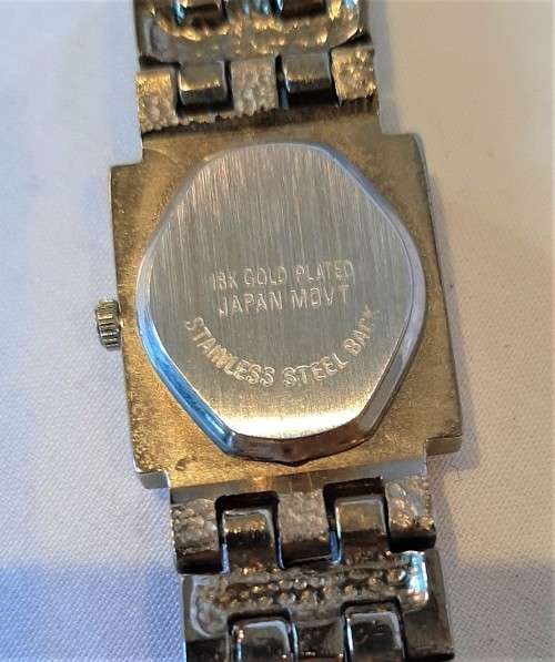 18k white gold plated ladies watch, quartz movement, strap and bezel encrusted Rhinestones NW