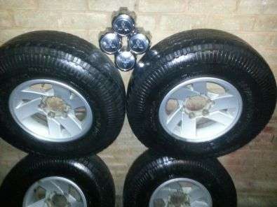 Mitsubishi 15" Mags and Tyres with Centre Caps and Nuts