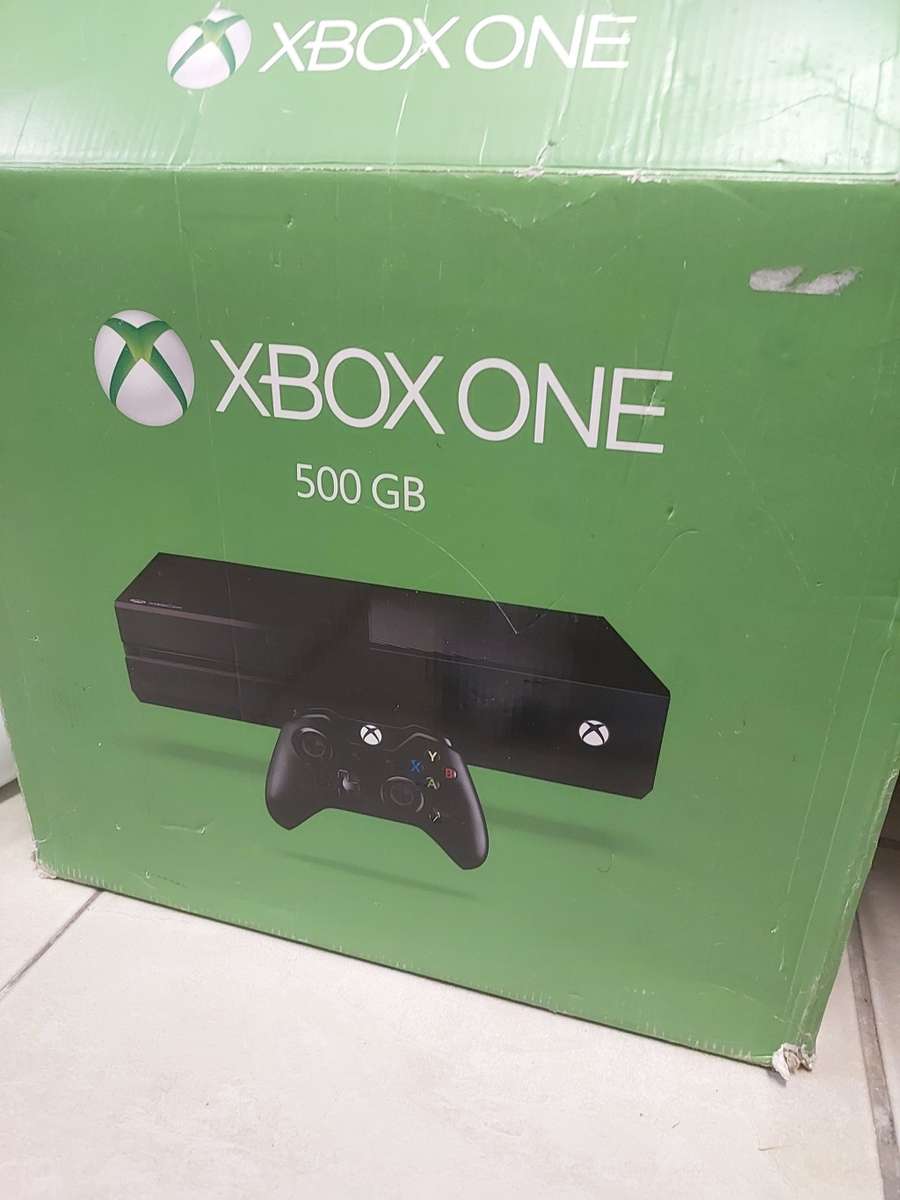 XBOX ONE 500GB CONSOLE (with 1x controller, 4x battery packs, 2x games)