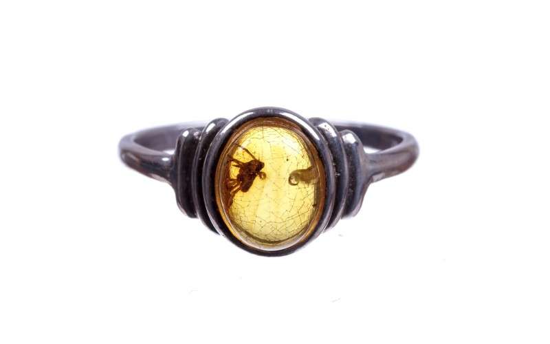 Silver ring with Amber inclusion