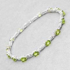 Elegant and Beautiful Brand New Bracelet With 6.30ctw Genuine Peridots Made of 925 Sterling silver.